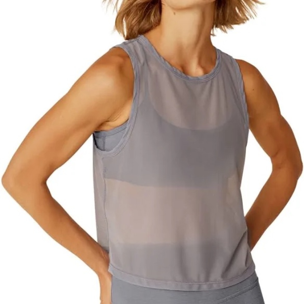 Beyond Yoga show off mesh tank in cloud gray
